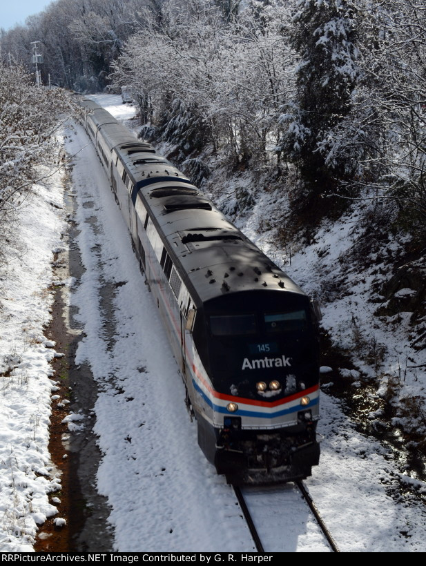 Heritage loco 145 leads Amtrak #20(2) under the Bedford Avenue bridge soon after departing (regrettably) Lynchburg.